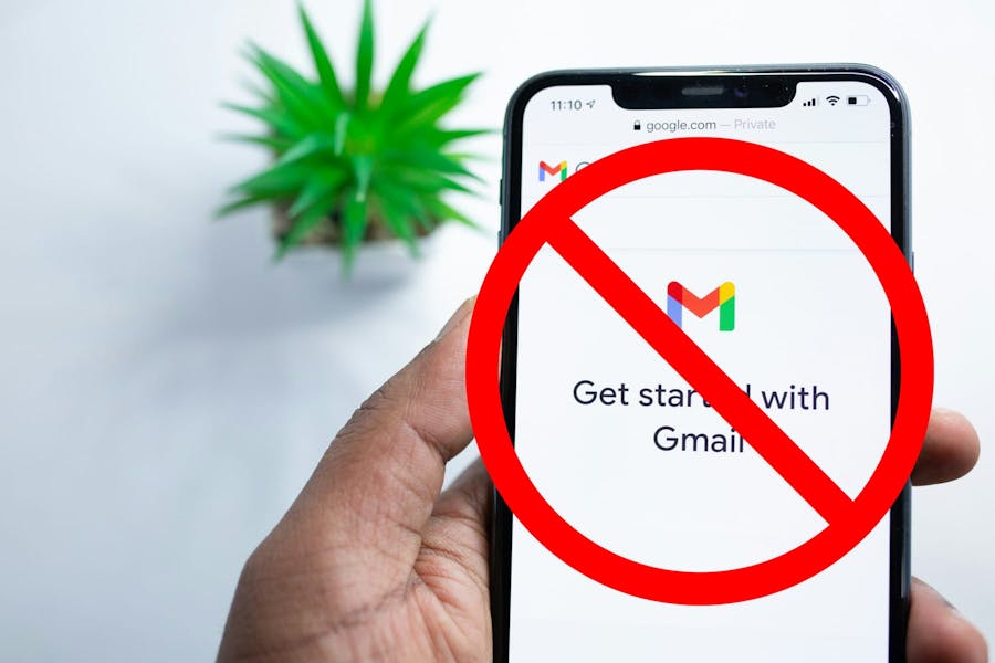“Mobile phone showing Gmail sign up screen with an X through it