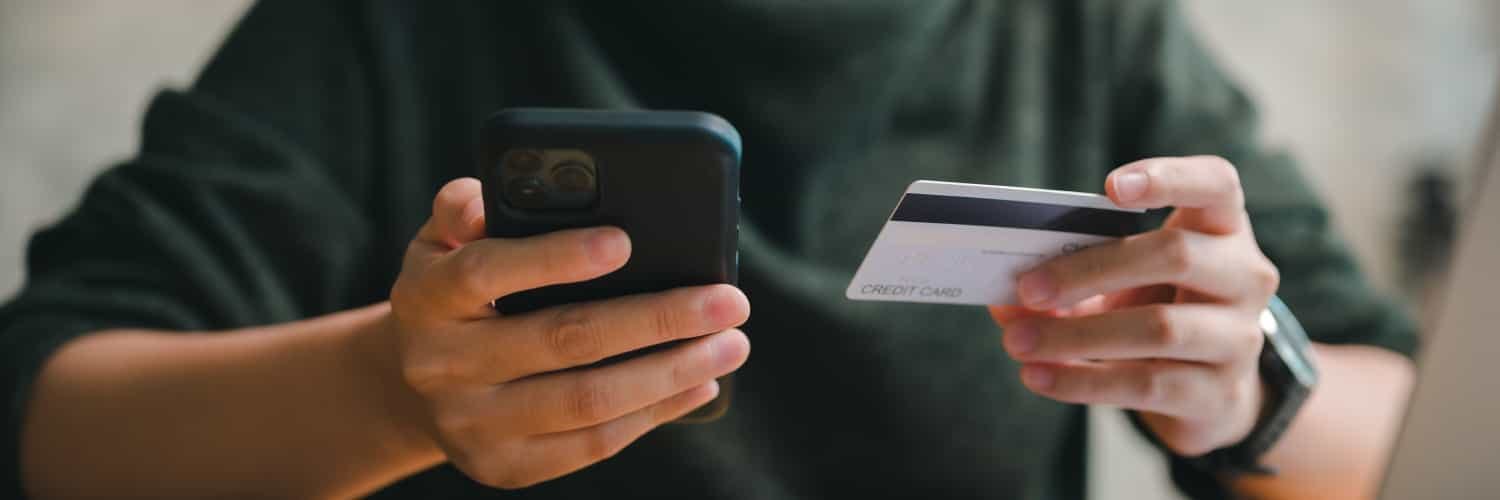 Hand holding credit card