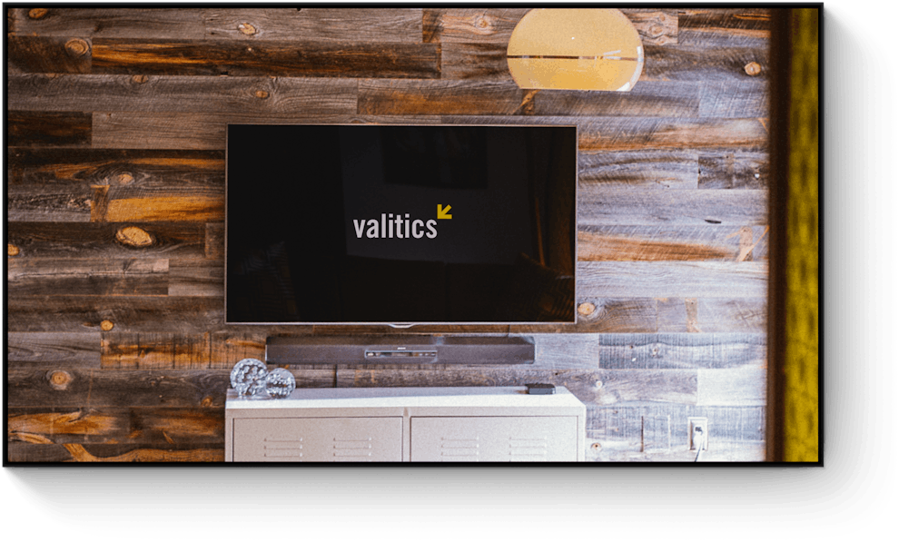 Valitics logo on TV screen in our office